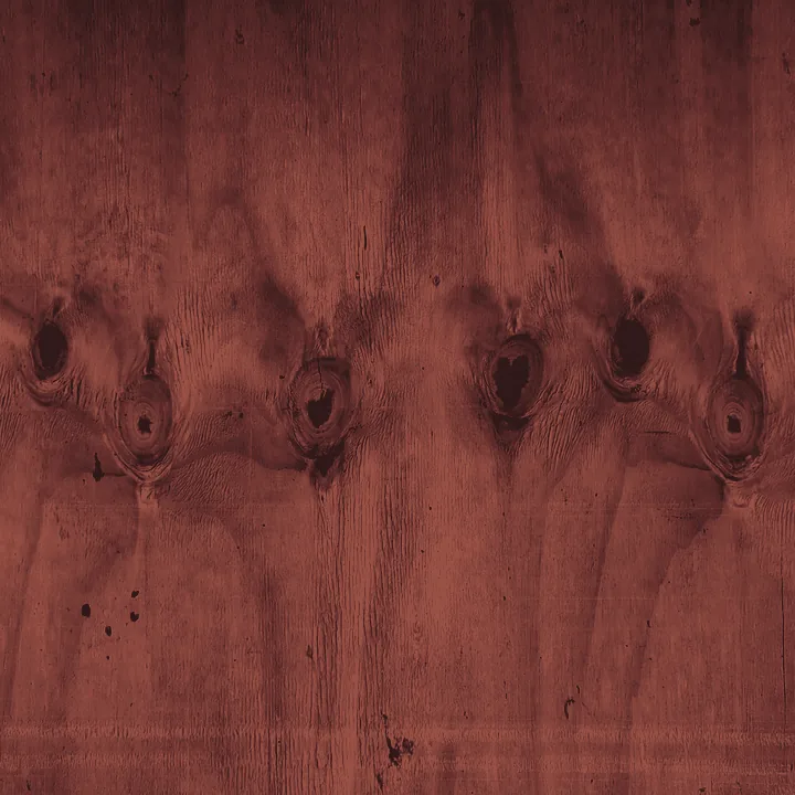 Mahogany stain direction shown on natural wood grain