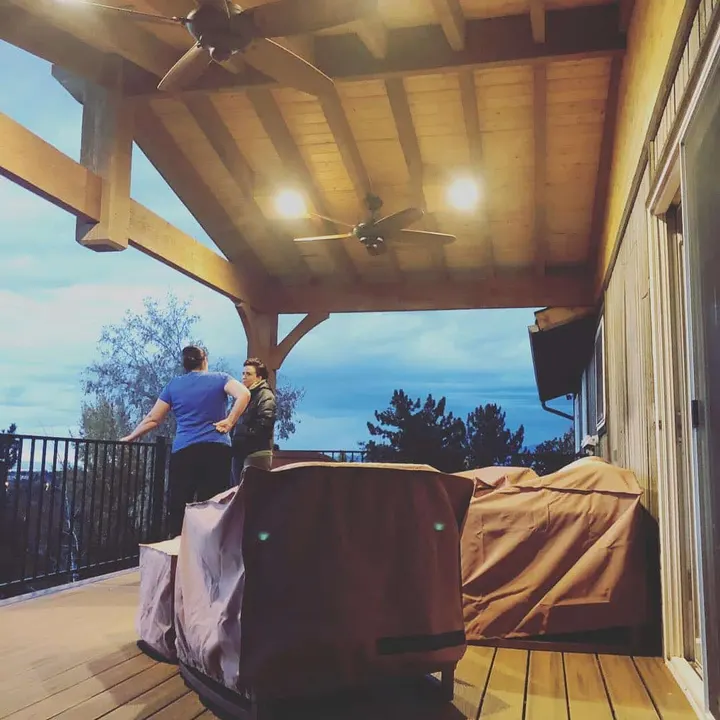 Covered deck cooking area during evening use