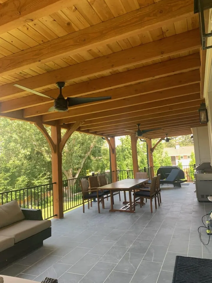 Roofed deck with outdoor dining furniture