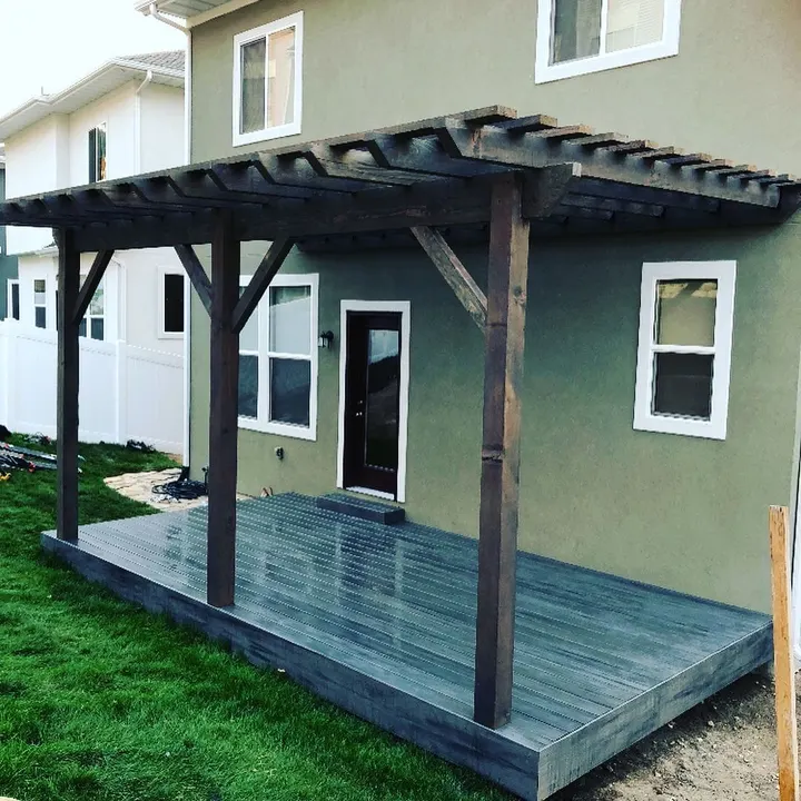 Long covered deck walkway beside a home