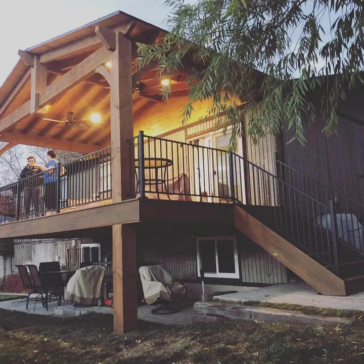Elevated covered deck photographed at night