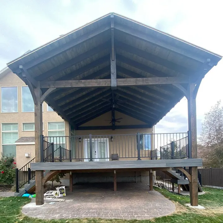 Gabled timber cover centered over a raised deck