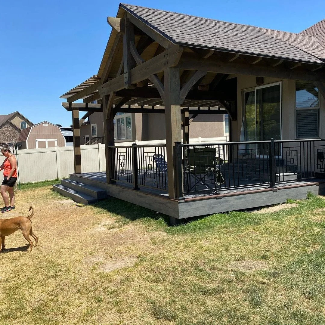 Gabled timber pavilion built over a raised deck