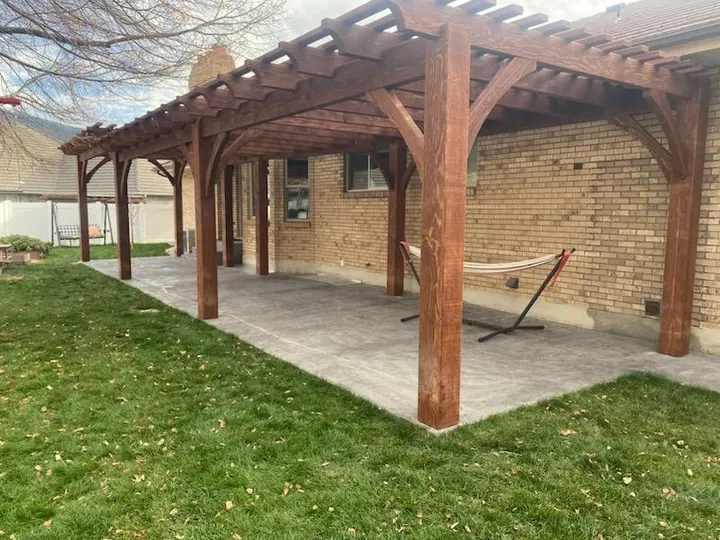 Long timber pergola covering an extended patio