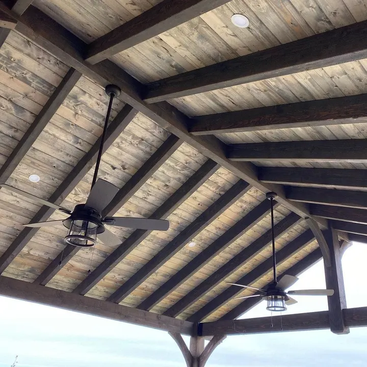 Timber pavilion ceiling with fan and recessed lighting