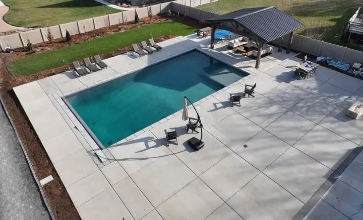 Aerial view of a pool and surrounding shade structures