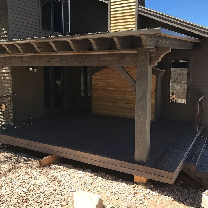 Small timber-covered deck with dark decking