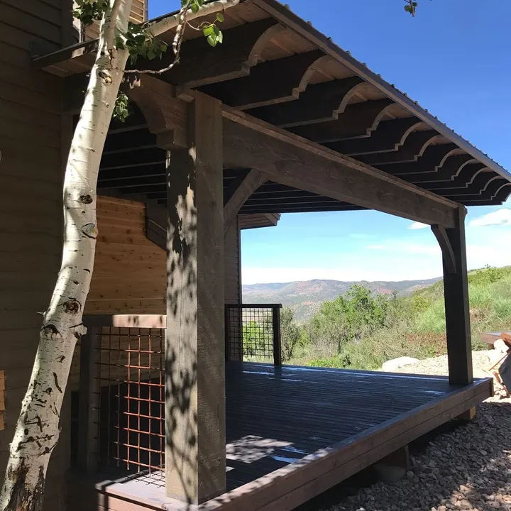 Compact gabled pavilion on a raised platform
