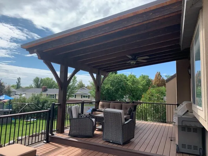 Timber shade structure over outdoor seating