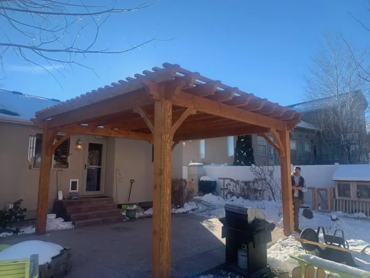 Timber pavilion photographed in winter conditions