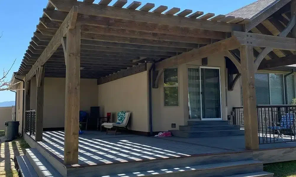 Custom timber pergola attached to a Utah home