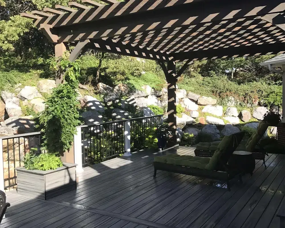 Timber pergola shading an outdoor deck and seating area